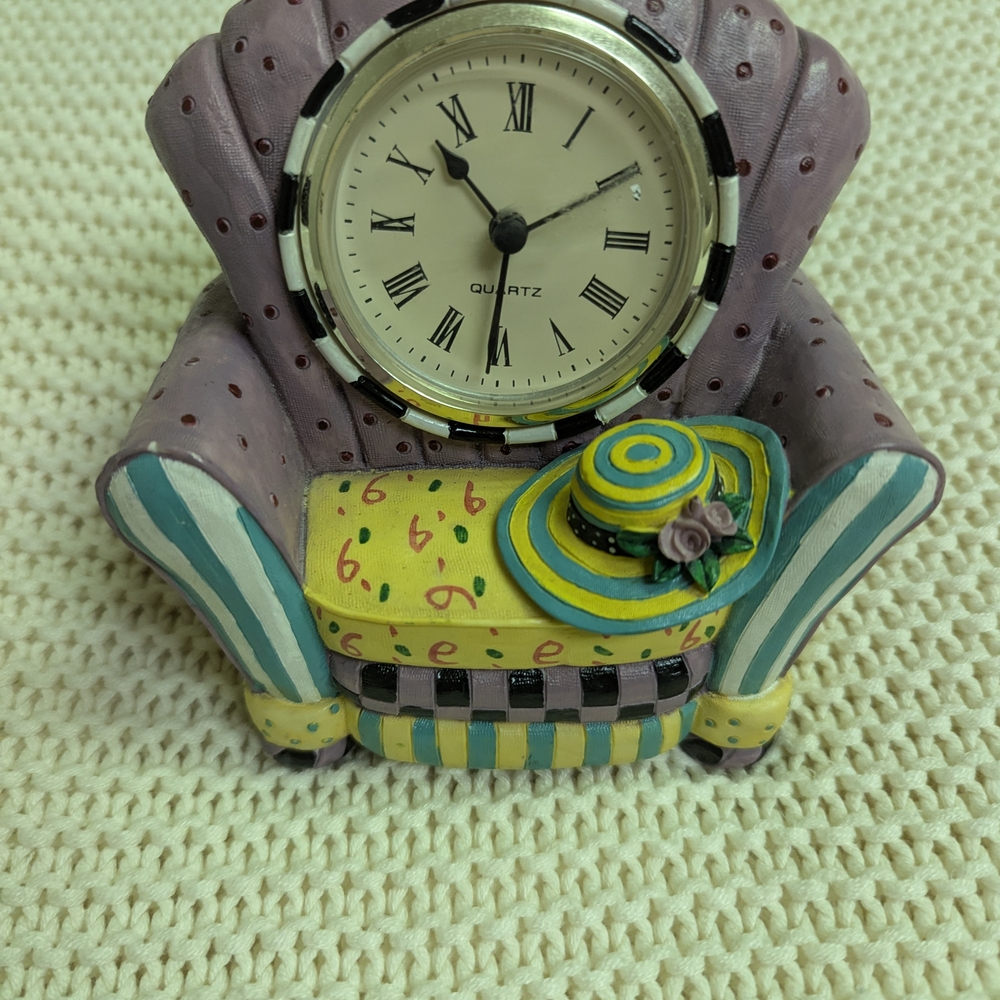 Whimsical Armchair Clock with Hat Decor